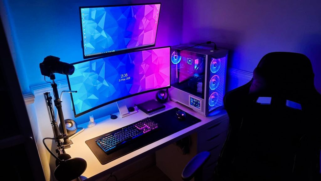 No Fuss Computers custom gaming PC with Ryzen 9 processor, RTX 4090 GPU, and dual gaming monitor setup